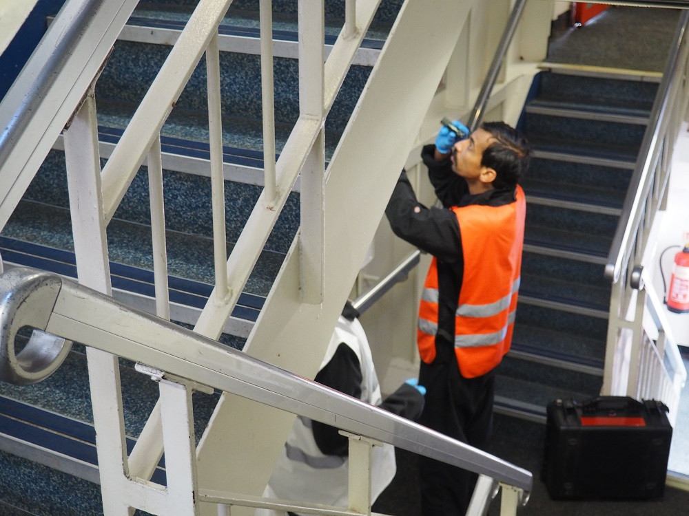A counter terrorism search in progress on a ferry by a search student